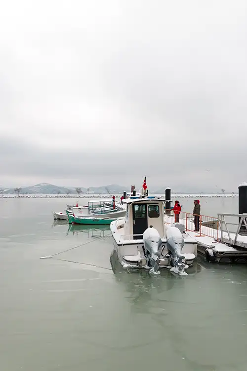 snowy shoreline frozen lakefront & winter boats collection (176)