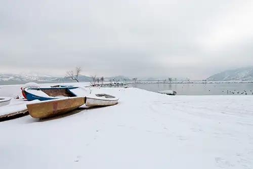 snowy shoreline frozen lakefront & winter boats collection (24)