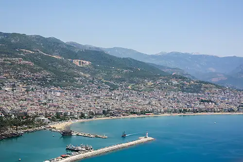 view of alanya's red tower and the coastline from above. (2)