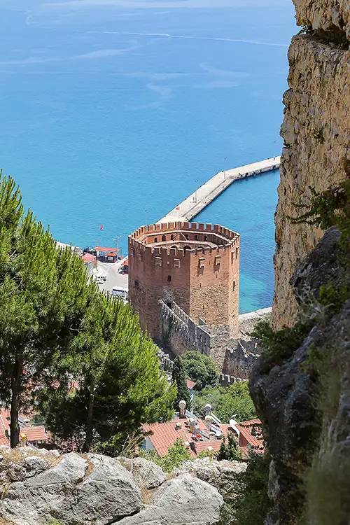 view of alanya's red tower and the coastline from above. (63)
