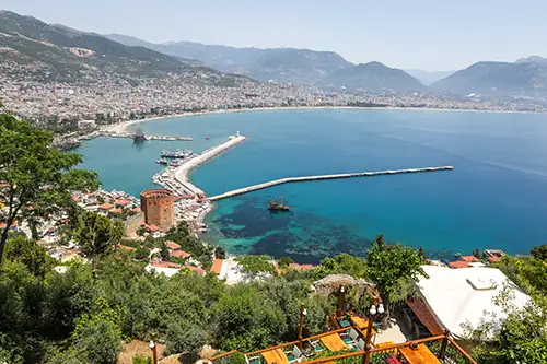 view of alanya's red tower and the coastline from above. (75)