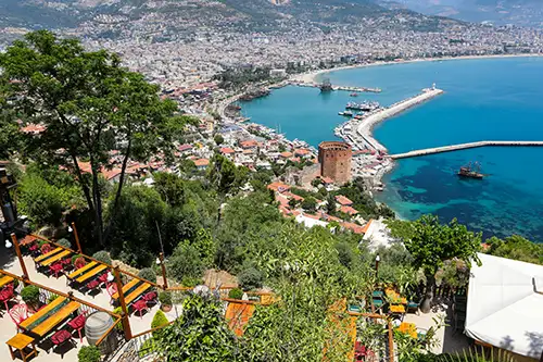 view of alanya's red tower and the coastline from above. (77)