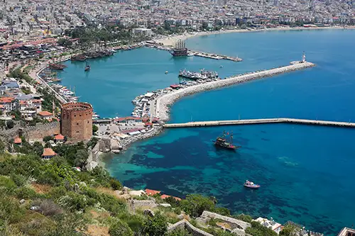 view of alanya's red tower and the coastline from above. (8)